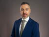Headshot of Tolga Yalkin, Chief Executive Officer